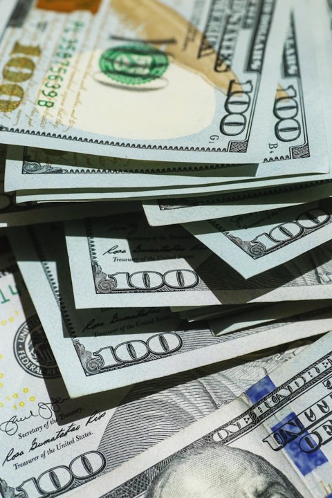 Stacked hundred dollar bills